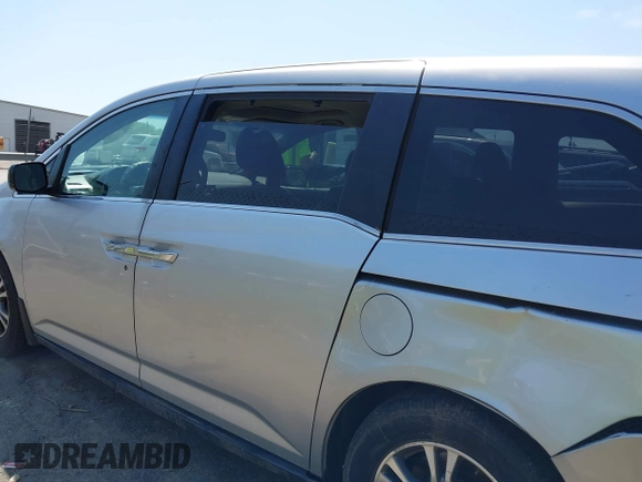 2011 Honda Odyssey EX-L with VIN 5FNRL5H62BB075789, listed as a IAAI auction lot 42035746 with 238,616 mi miles and . Bid and sale history available at carsss.com. Image 14.