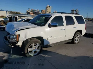 2014 Chevrolet Tahoe LT with VIN 1GNSCBE03ER158489, listed as a Copart auction lot 49270025 with 131,546 mi miles and Salvage title. Bid and sale history available at DreamBid. Image 1.
