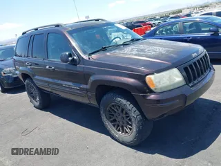 2004 Jeep Grand Cherokee Laredo with VIN 1J4GW48S94C121683, listed as a IAAI auction lot 42474830 with 206,169 mi miles and . Bid and sale history available at DreamBid. Image 1.