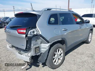 2016 Jeep Cherokee Latitude z VIN 1C4PJMCS5GW243746, wystawiony jako IAAI lot #41346904 z przebiegiem 98 616 mil mil oraz . Historia ofert i sprzedaży dostępna na DreamBid. Obrazek 4.