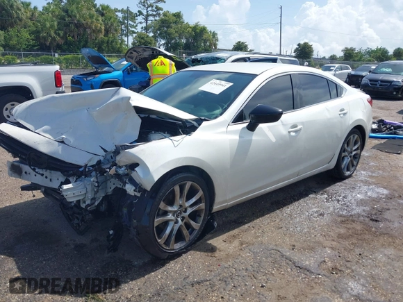 2015 Mazda 6 i Touring with VIN JM1GJ1V5XF1218908, listed as a IAAI auction lot 42449941 with Not provided miles and . Bid and sale history available at DreamBid. Image 2.
