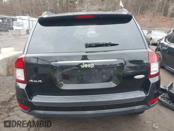 2015 Jeep Compass Latitude with VIN 1C4NJDEB3FD105704, listed as a IAAI auction lot 41719603 with 106,904 mi miles. Bid and sale history available at carsss.com. Image 16.