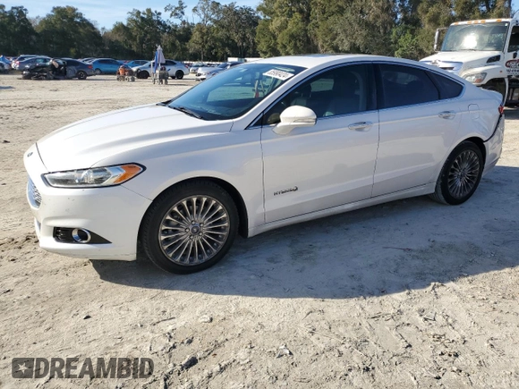 2013 Ford Fusion Titanium Hybrid with VIN 3FA6P0RU2DR277773, listed as a Copart auction lot 85990424 with 215,289 mi miles and Non Repairable. Bid and sale history available at DreamBid. Image 1.