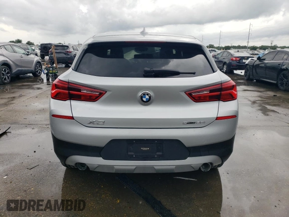 2018 BMW X2 sDrive28i with VIN WBXYJ3C32JEJ75719, listed as a Copart auction lot 60884755 with Not provided miles and Salvage title. Bid and sale history available at DreamBid. Image 6.