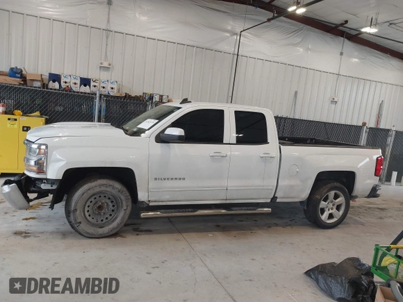 2018 Chevrolet Silverado 1500 LT with VIN 1GCRCREC0JZ204834, listed as a IAAI auction lot 41363579 with 135,247 mi miles and . Bid and sale history available at DreamBid. Image 14.