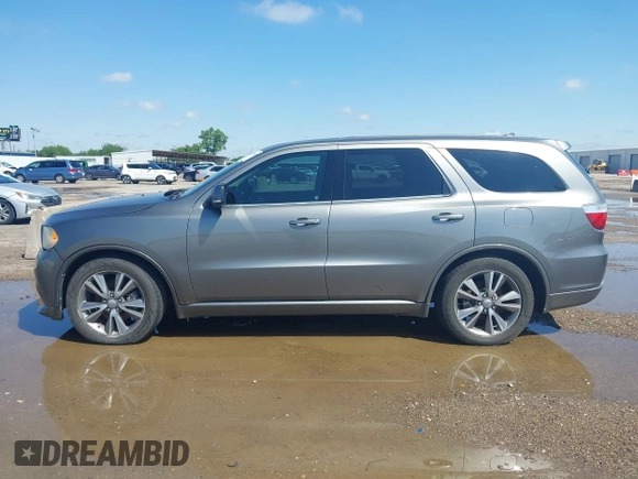 2013 Dodge Durango R/T z VIN 1C4SDHCT7DC564802, wystawiony jako IAAI lot #42348957 z przebiegiem 178 354 mil mil oraz . Historia ofert i sprzedaży dostępna na DreamBid. Obrazek 14.