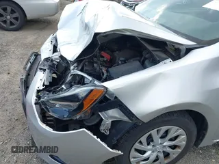 2018 Toyota Corolla L with VIN 2T1BURHE7JC038172, listed as a IAAI auction lot 42473864 with 83,657 mi miles and . Bid and sale history available at DreamBid. Image 19.