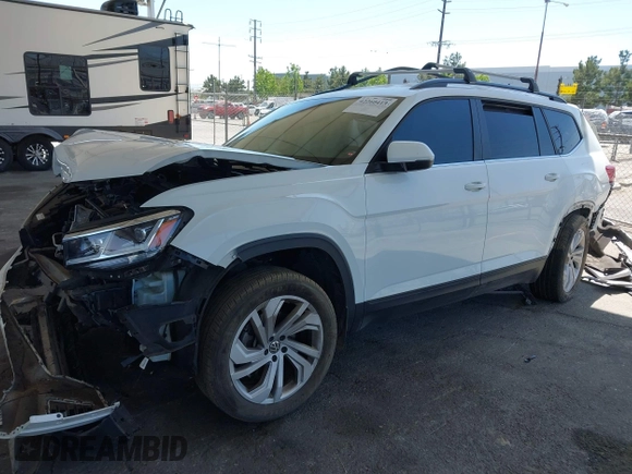 2021 Volkswagen Atlas SE z VIN 1V2HR2CA8MC514027, wystawiony jako IAAI lot #42260413 z przebiegiem 37 687 mil mil oraz . Historia ofert i sprzedaży dostępna na DreamBid. Obrazek 17.