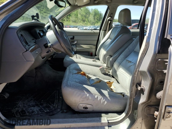 2004 Ford Crown Victoria LX z VIN 2FAFP74W14X130606, wystawiony jako Copart lot #54120085 z przebiegiem 221 700 mil mil oraz Szkody całkowita. Historia ofert i sprzedaży dostępna na DreamBid. Obrazek 7.