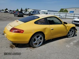 1999 Porsche 911 z VIN WP0AA2998XS620298, wystawiony jako Copart lot #59540745 z przebiegiem Nie podano mil oraz Szkoda całkowita • Salvage title. Historia ofert i sprzedaży dostępna na DreamBid. Obrazek 3.