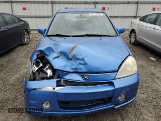 2004 Suzuki Aerio SX z VIN JS2RC61H145254580, wystawiony jako Copart lot #85777764 z przebiegiem 115 762 mil mil oraz Szkoda całkowita • Salvage title. Historia ofert i sprzedaży dostępna na DreamBid. Obrazek 5.