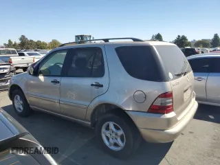2001 Mercedes-Benz M-Class with VIN 4JGAB54E01A274839, listed as a Copart auction lot 72660884 with 190,934 mi miles and Clean Title. Bid and sale history available at carsss.com. Image 2.