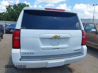 2020 Chevrolet Tahoe LTZ with VIN 1GNSCCKCXLR215899, listed as a IAAI auction lot 40128171 with 109,541 mi miles and . Bid and sale history available at DreamBid. Image 16.