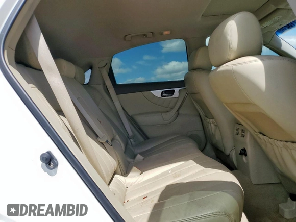 2014 Infiniti QX70 z VIN JN8CS1MU7EM450565, wystawiony jako Copart lot #55931325 z przebiegiem 159 813 mil mil oraz Szkoda całkowita • Salvage title. Historia ofert i sprzedaży dostępna na DreamBid. Obrazek 11.