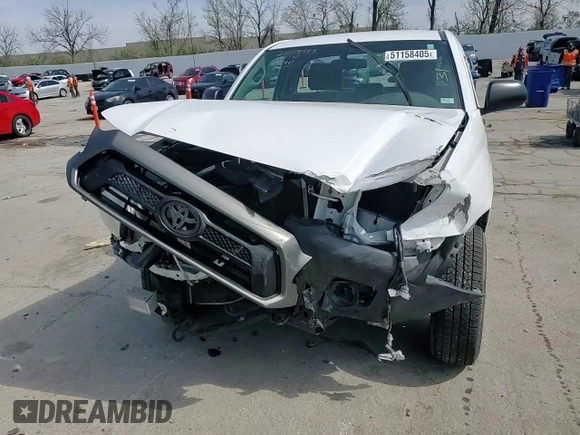 2014 Toyota Tacoma z VIN 5TFNX4CN6EX037942, wystawiony jako Copart lot #51158405 z przebiegiem 157 825 mil mil oraz Szkoda całkowita • Salvage title. Historia ofert i sprzedaży dostępna na DreamBid. Obrazek 11.