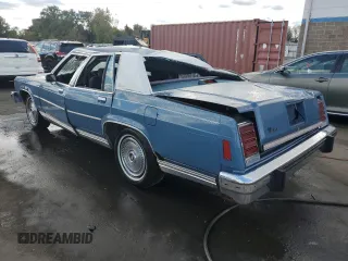 1987 Ford Ltd Crown Victoria with VIN 2FABP73F5HX115600, listed as a Copart auction lot 74781524 with 21,565 mi miles and Salvage Title. Bid and sale history available at carsss.com. Image 2.