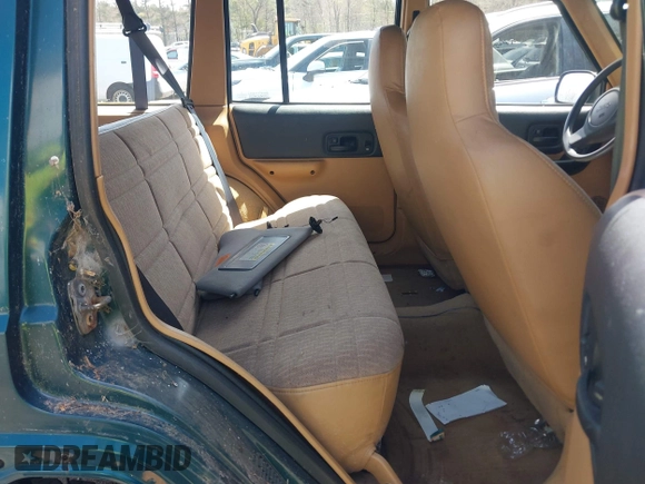 1998 Jeep Cherokee Sport with VIN 1J4FJ68S6WL151698, listed as a IAAI auction lot 42100846 with 239,466 mi miles. Bid and sale history available at carsss.com. Image 8.