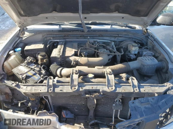2009 Nissan Frontier SE with VIN 1N6BD06T59C403088, listed as a Copart auction lot 82567274 with 101,255 mi miles and Salvage title. Bid and sale history available at DreamBid. Image 11.