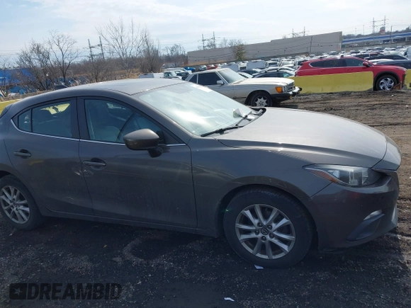 2014 Mazda 3 i Grand Touring with VIN JM1BM1M75E1207754, listed as a IAAI auction lot 41698583 with 128,887 mi miles and . Bid and sale history available at DreamBid. Image 13.