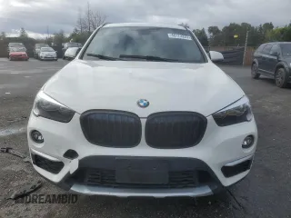 2017 BMW X1 sDrive28i with VIN WBXHU7C32H5H37758, listed as a Copart auction lot 48173225 with 86,488 mi miles and Salvage Title. Bid and sale history available at carsss.com. Image 5.