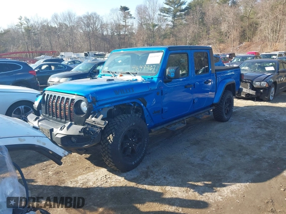 2021 Jeep Gladiator Willys with VIN 1C6HJTAG3ML572690, listed as a IAAI auction lot 41649907 with 74,734 mi miles and . Bid and sale history available at DreamBid. Image 2.