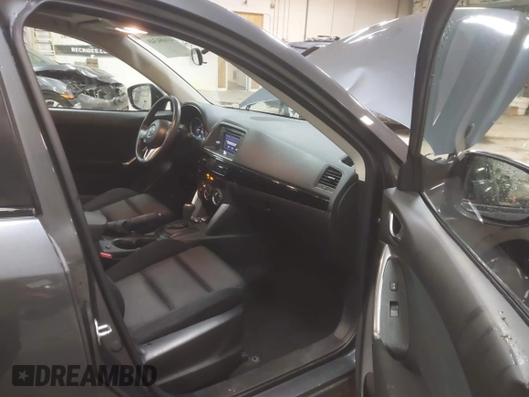 2013 Mazda CX-5 Touring with VIN JM3KE4CE4D0157892, listed as a IAAI auction lot 41684348 with 146,496 mi miles and . Bid and sale history available at DreamBid. Image 5.