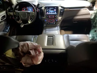 2015 GMC Yukon Denali with VIN 1GKS2CKJ2FR677604, listed as a Copart auction lot 51714505 with 146,648 mi miles and Salvage Title. Bid and sale history available at carsss.com. Image 8.