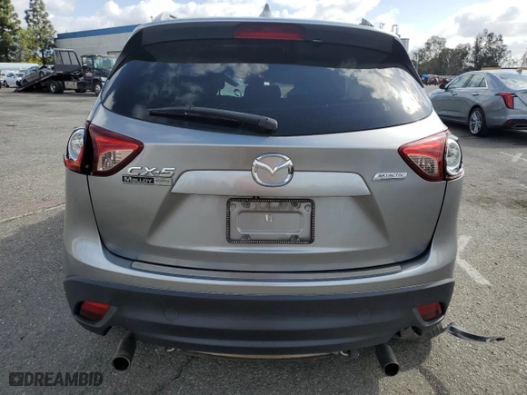 2014 Mazda CX-5 Touring with VIN JM3KE2CYXE0320996, listed as a Copart auction lot 51366485 with 102,472 mi miles and Salvage Title. Bid and sale history available at carsss.com. Image 6.