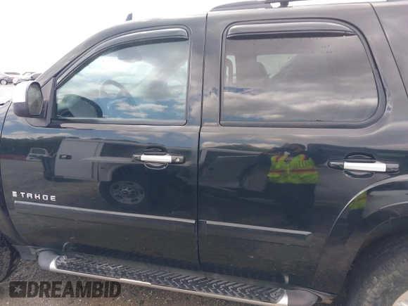 2007 Chevrolet Tahoe LT z VIN 1GNFK13097R388333, wystawiony jako IAAI lot #41948201 z przebiegiem 253 972 mil mil oraz . Historia ofert i sprzedaży dostępna na DreamBid. Obrazek 14.