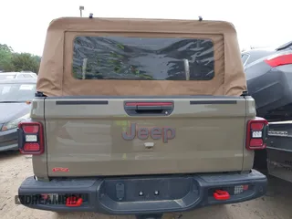 2020 Jeep Gladiator Rubicon z VIN 1C6JJTBG6LL179541, wystawiony jako IAAI lot #42050510 z przebiegiem 52 784 mil mil oraz . Historia ofert i sprzedaży dostępna na DreamBid. Obrazek 15.
