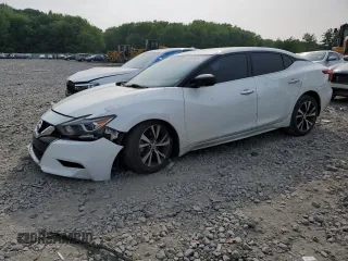 2016 Nissan Maxima Platinum with VIN 1N4AA6AP2GC448688, listed as a Copart auction lot 60551825 with 138,857 mi miles and Salvage title. Bid and sale history available at DreamBid. Image 1.