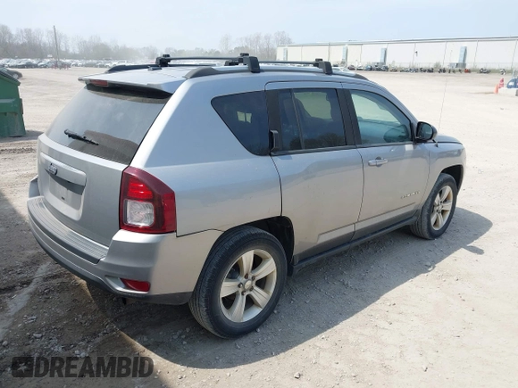 2016 Jeep Compass Sport with VIN 1C4NJDBB1GD566261, listed as a IAAI auction lot 42122853 with 212,060 mi miles. Bid and sale history available at carsss.com. Image 4.