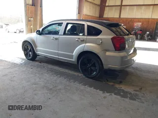 2011 Dodge Caliber Mainstreet with VIN 1B3CB3HA4BD121598, listed as a IAAI auction lot 41202366 with 92,012 mi miles. Bid and sale history available at carsss.com. Image 3.