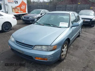 1995 Honda Accord EX w/Leather with VIN 1HGCD5665SA132230, listed as a IAAI auction lot 41955713 with 101,999 mi miles. Bid and sale history available at carsss.com. Image 2.