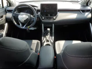 2024 Toyota Corolla Cross XLE with VIN 7MUDAABG4RV105641, listed as a Copart auction lot 58950855 with 5,805 mi miles and Salvage title. Bid and sale history available at DreamBid. Image 8.