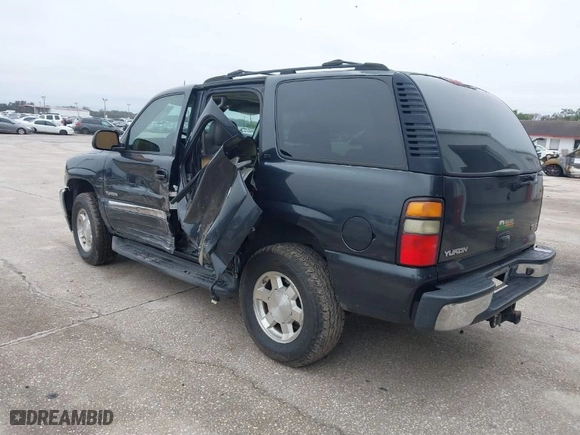 2005 GMC Yukon SLT with VIN 1GKEC13T15J221363, listed as a IAAI auction lot 41388170 with 233,577 mi miles. Bid and sale history available at carsss.com. Image 3.