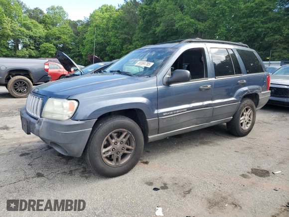 2004 Jeep Grand Cherokee Laredo with VIN 1J4GX48S24C216941, listed as a Copart auction lot 55584785 with 279,710 mi miles and Salvage title. Bid and sale history available at DreamBid. Image 1.