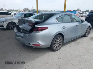 2020 Mazda 3 Select with VIN 3MZBPACL6LM131481, listed as a IAAI auction lot 42118795 with 104,102 mi miles and . Bid and sale history available at DreamBid. Image 4.