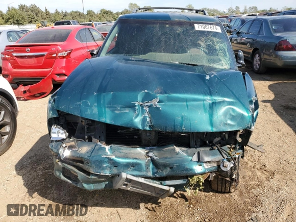 1996 GMC Jimmy SL with VIN 1GKCS13W0T2553905, listed as a Copart auction lot 71007674 with 169,513 mi miles and Salvage Title. Bid and sale history available at carsss.com. Image 5.