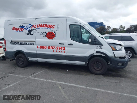 2021 Ford Transit Cargo z VIN 1FTBR1C87MKA81434, wystawiony jako IAAI lot #41759890 z przebiegiem 221 227 mil mil oraz . Historia ofert i sprzedaży dostępna na DreamBid. Obrazek 13.