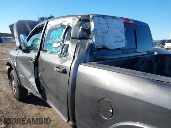 2021 Ram 2500 Laramie z VIN 3C6UR5FL7MG629012, wystawiony jako IAAI lot #41369353 z przebiegiem 168 099 mil mil oraz . Historia ofert i sprzedaży dostępna na DreamBid. Obrazek 6.