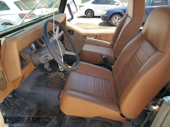 1994 Jeep Wrangler S with VIN 1J4FY19P7RP437520, listed as a Copart auction lot 57447085 with 124,023 mi miles and Salvage title. Bid and sale history available at DreamBid. Image 7.