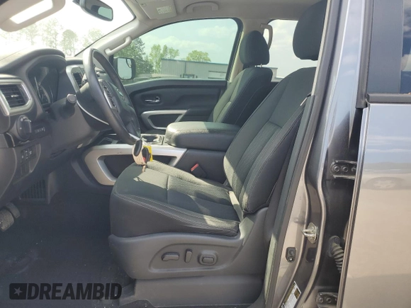 2018 Nissan Titan SV with VIN 1N6AA1E65JN509510, listed as a Copart auction lot 52459525 with 65,164 mi miles and Salvage Title. Bid and sale history available at carsss.com. Image 7.