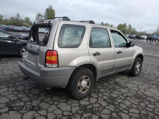 2001 Ford Escape XLS with VIN 1FMYU02111KA37010, listed as a Copart auction lot 52328415 with 312,425 mi miles and Salvage title. Bid and sale history available at DreamBid. Image 3.