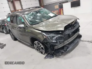 2023 Subaru Ascent Touring z VIN 4S4WMAWD7P3411589, wystawiony jako IAAI lot #42096301 z przebiegiem 41 811 mil mil oraz . Historia ofert i sprzedaży dostępna na DreamBid. Obrazek 1.