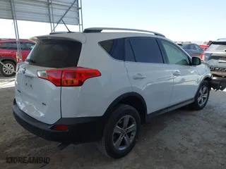 2015 Toyota RAV4 XLE with VIN JTMWFREVXFD066557, listed as a IAAI auction lot 41825354 with 173,595 mi miles. Bid and sale history available at carsss.com. Image 4.