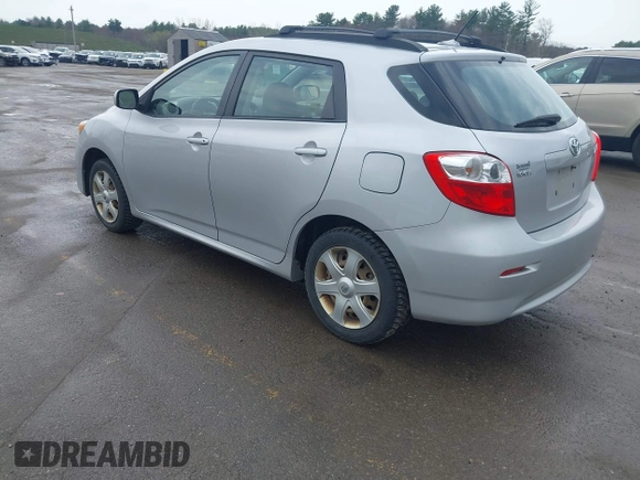 2009 Toyota Matrix with VIN 2T1KU40E99C006768, listed as a IAAI auction lot 42125813 with 163,832 mi miles. Bid and sale history available at carsss.com. Image 3.