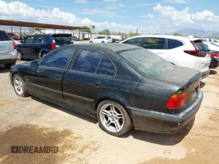 2000 BMW 5 Series 540i with VIN WBADN6348YGM67042, listed as a IAAI auction lot 42777403 with 163,701 mi miles and . Bid and sale history available at DreamBid. Image 3.