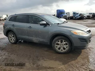 2011 Mazda CX-9 Touring with VIN JM3TB2CA1B0325032, listed as a Copart auction lot 54110615 with 134,418 mi miles and Salvage title. Bid and sale history available at DreamBid. Image 4.