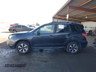 2017 Subaru Forester Premium with VIN JF2SJAEC2HH801848, listed as a IAAI auction lot 41532453 with 60,547 mi miles and . Bid and sale history available at DreamBid. Image 14.